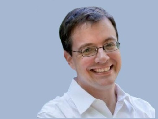 Portrait of Sam Flemming on About Us Page